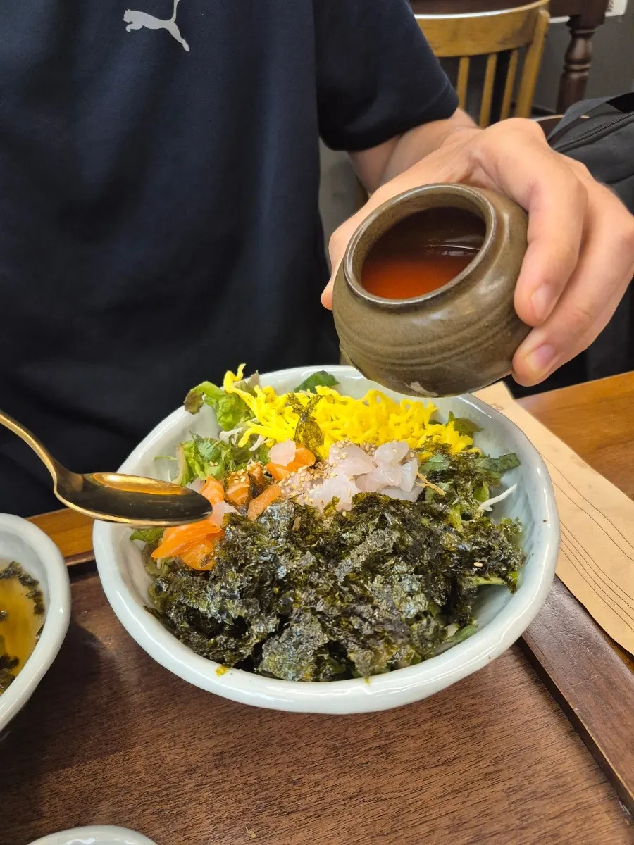 Sashimi rice bowl topped with handmade apple vinegar sauce