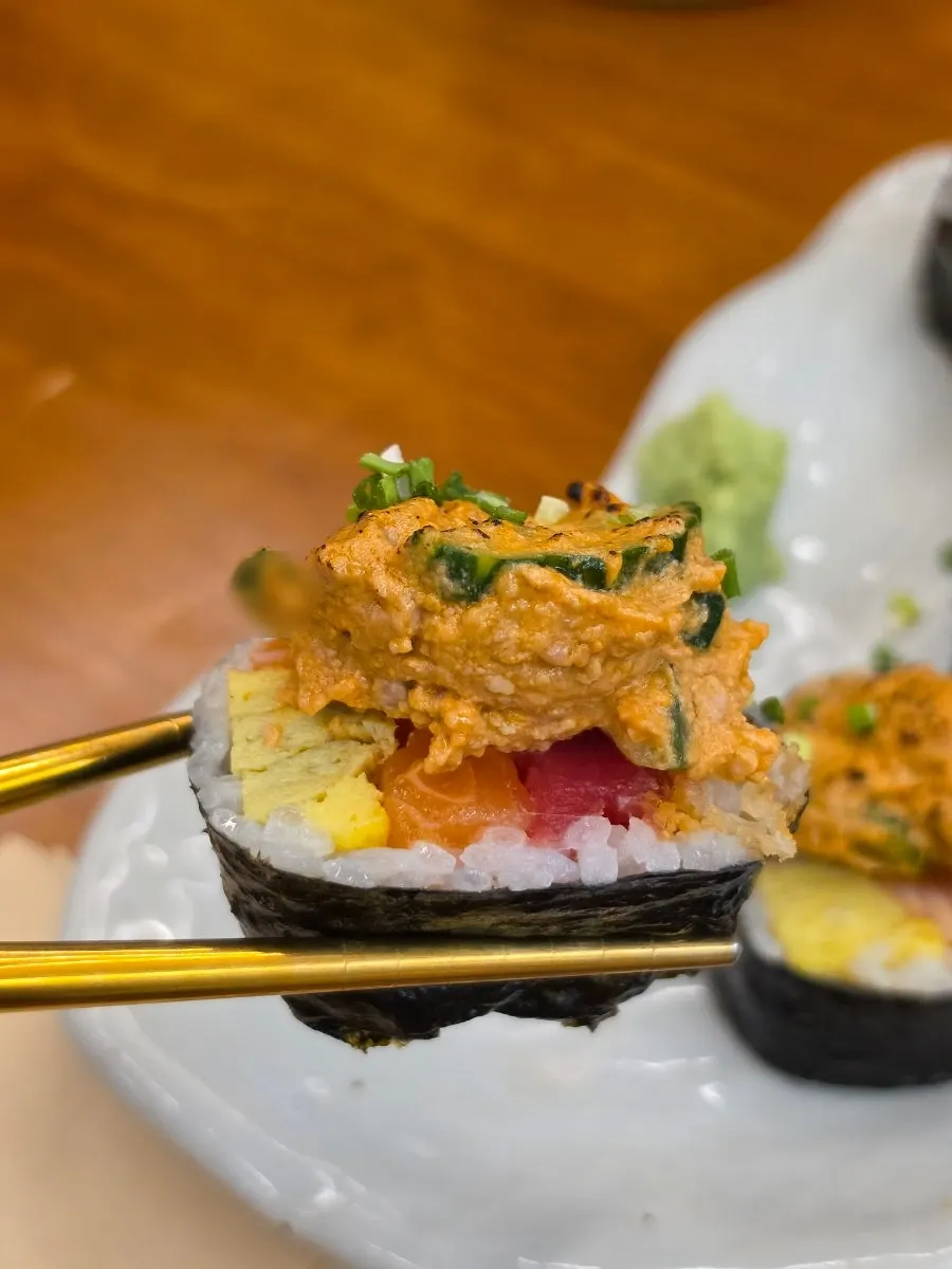 A large piece of rolled ankimo futomaki