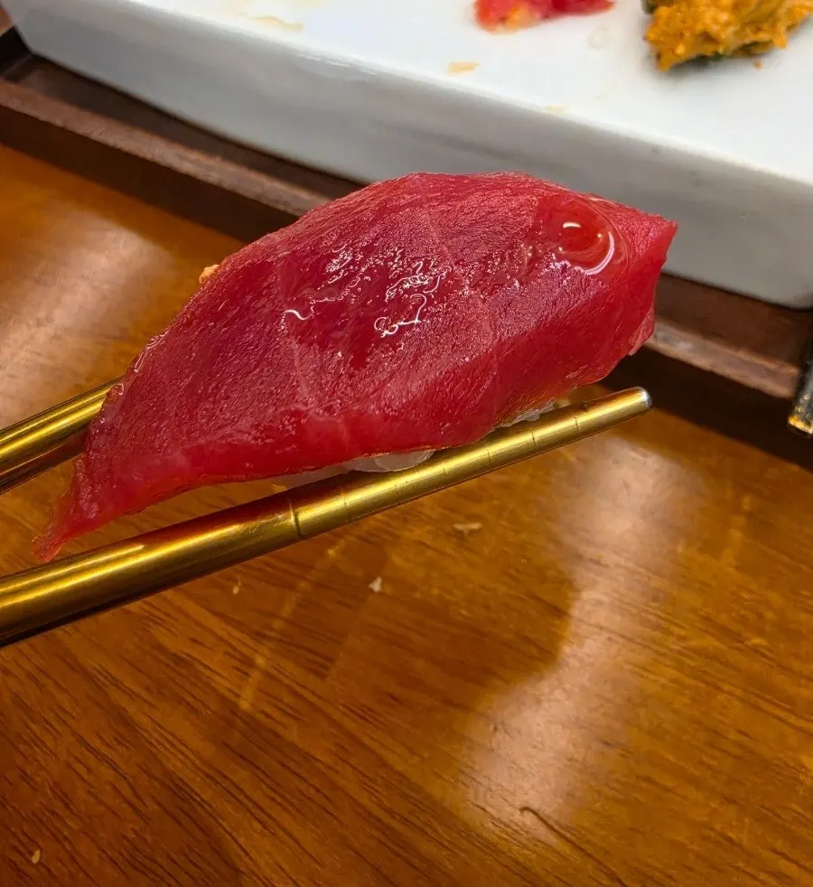 Close-up of konbu-jime aged sushi