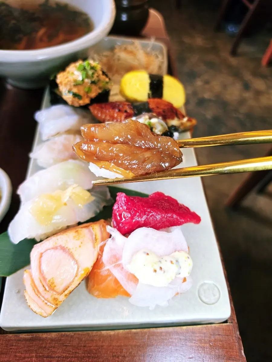 Seared salmon sushi with a touch of char