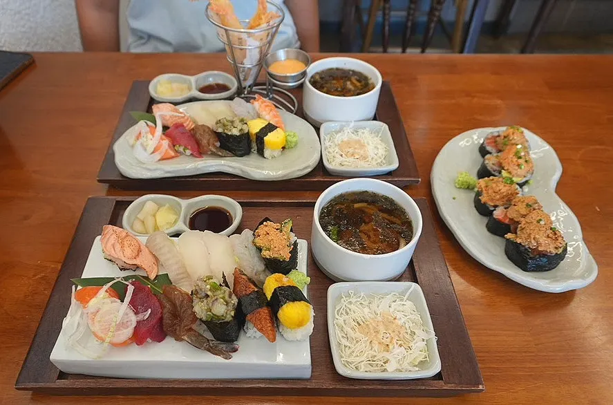 Sushi menu listing Sang and Geuksang aged sushi platters