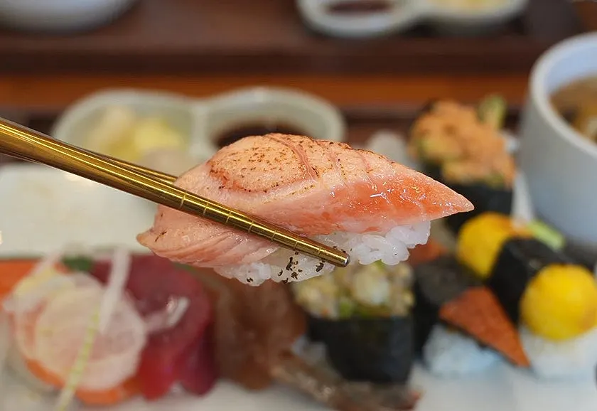Thick torched salmon nigiri