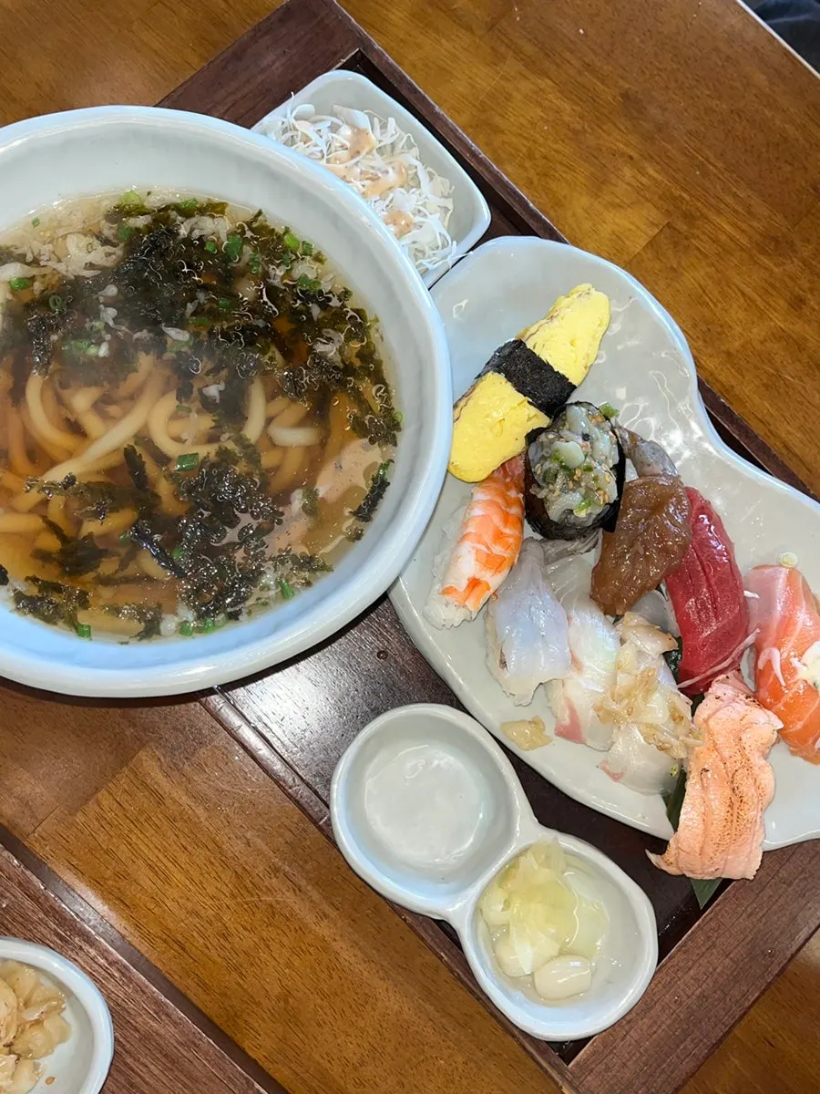 Close-up of sushi topped with aged sashimi