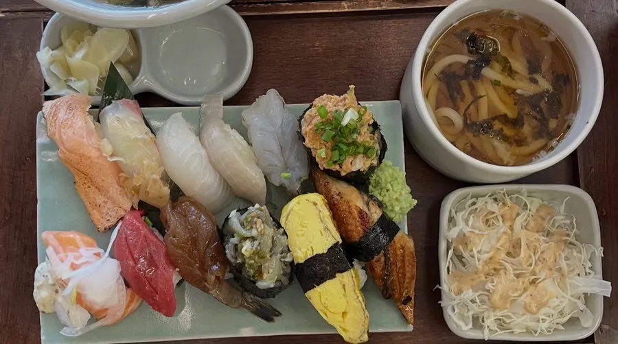 Aged sushi pieces laid out by type