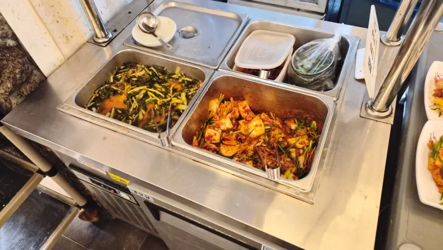 Acorn kalguksu served with geotjeori and yeolmu kimchi