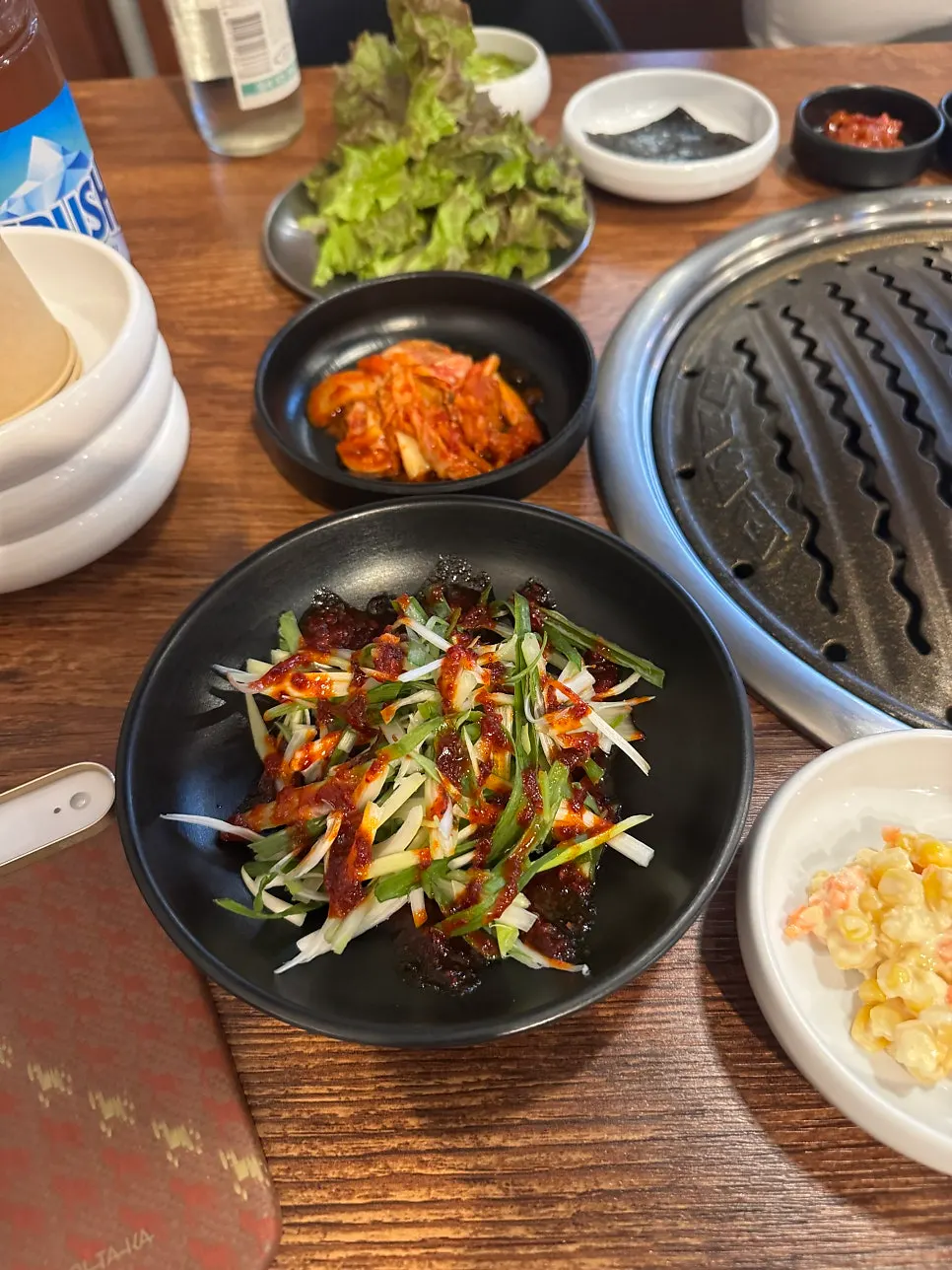 Table with side dishes and sauces laid out