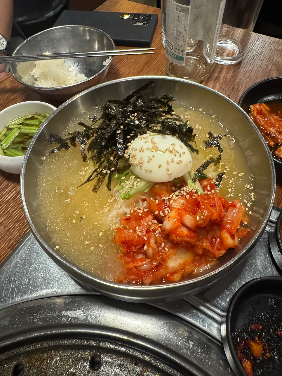 Kimchi-mari guksu with a thin layer of ice