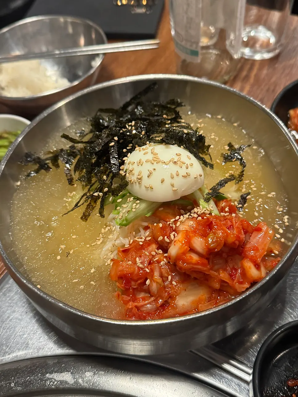 A bowl of kimchi-mari guksu eaten as a palate cleanser