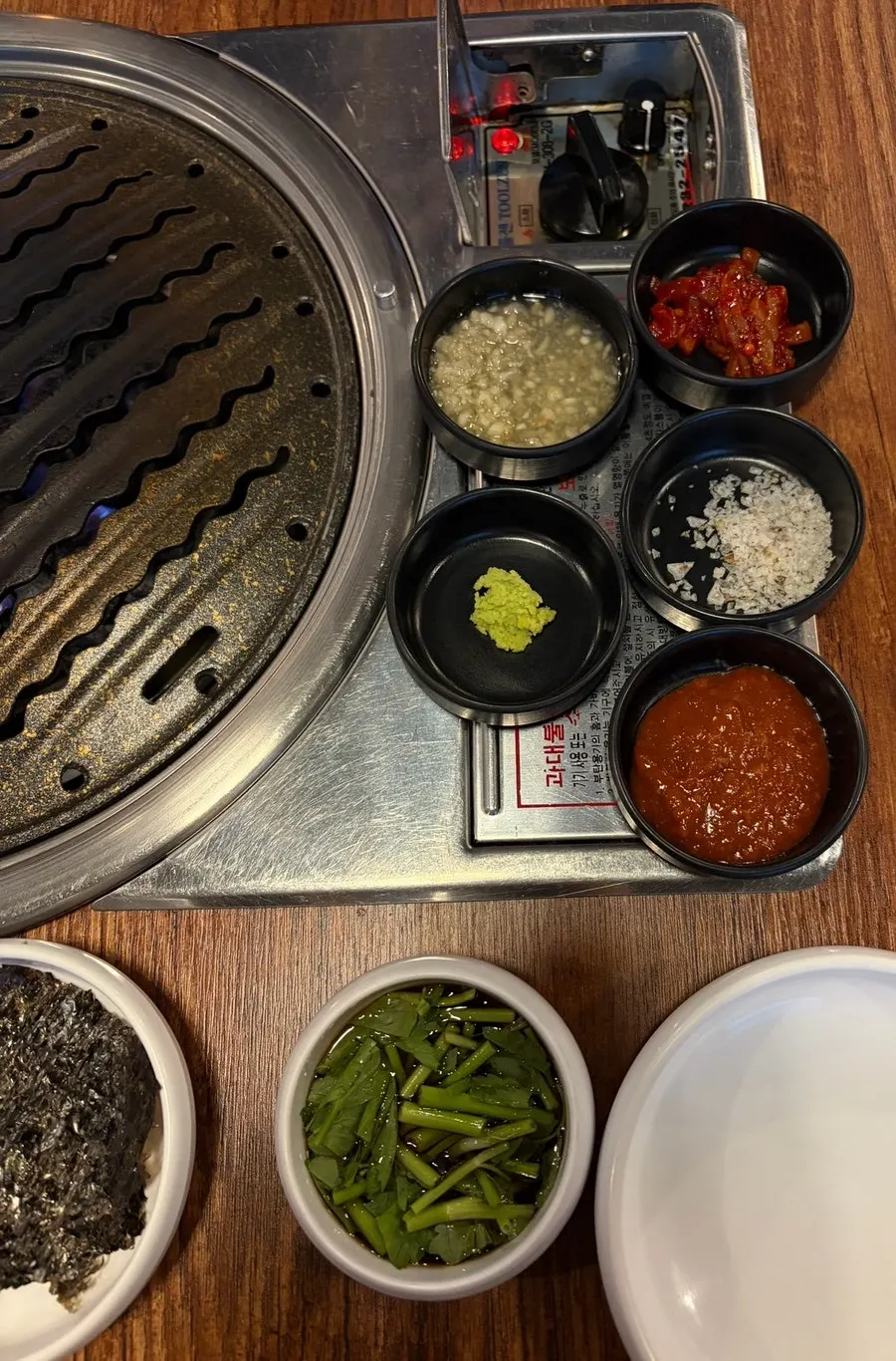Table set with side dishes that pair well with grilled meat