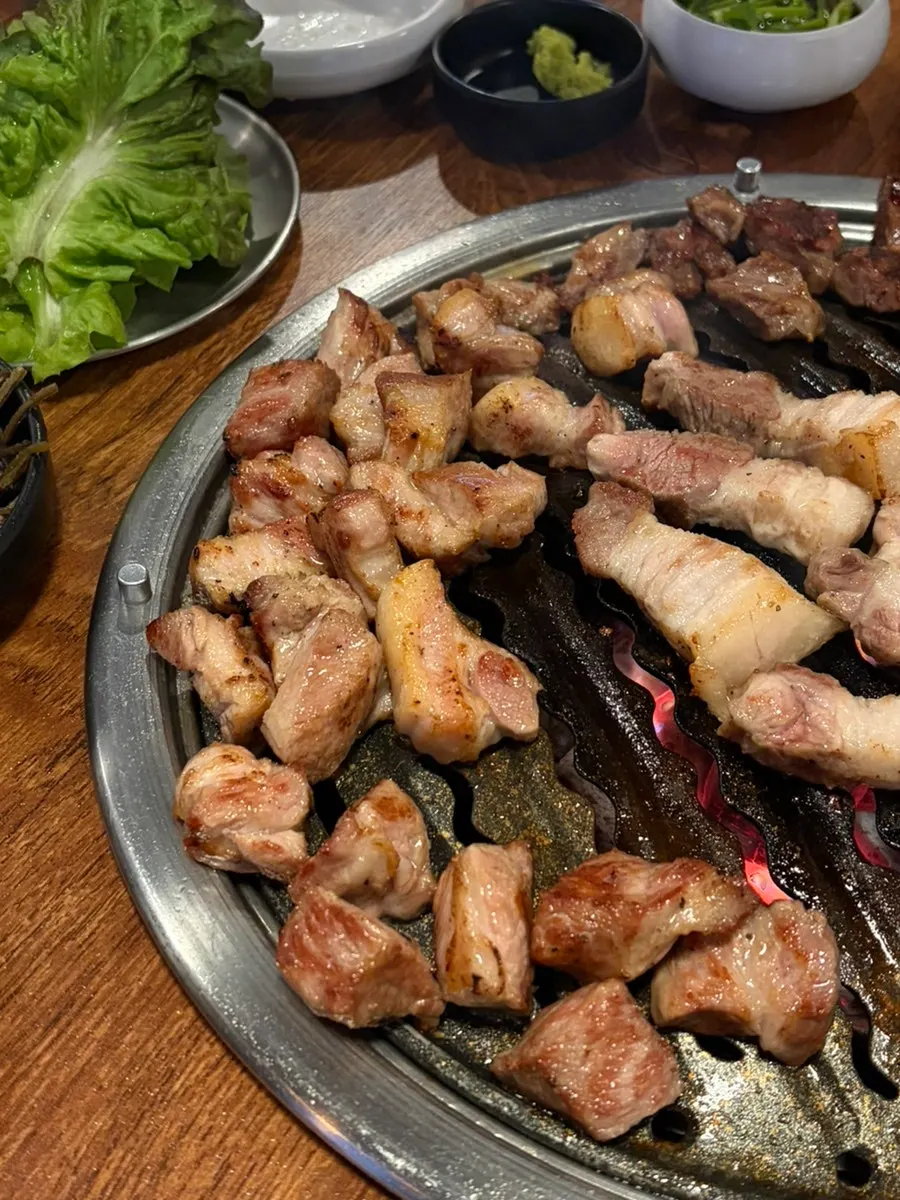 A golden-brown platter of grilled han-don pork