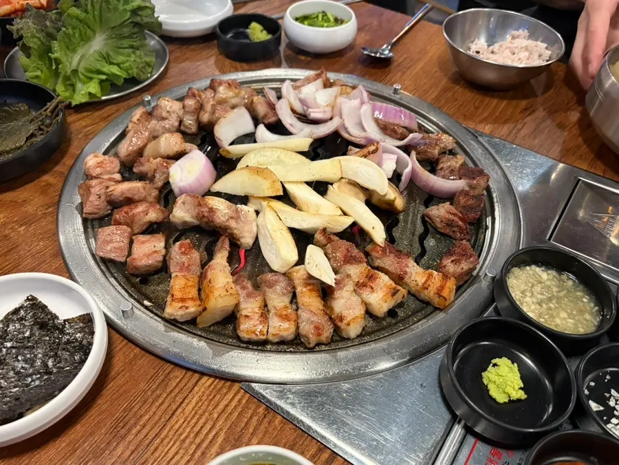 Onion, mushroom, and potato grilled alongside the meat