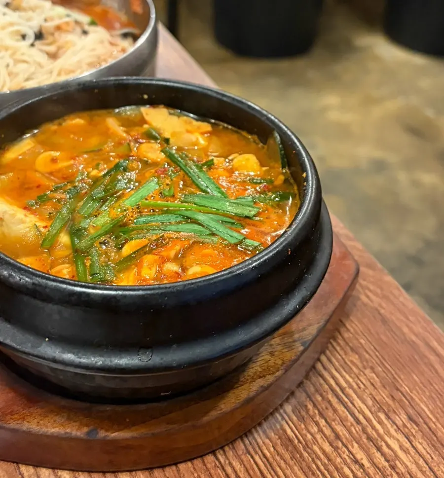 Doenjang jjigae included in the set, packed with ingredients