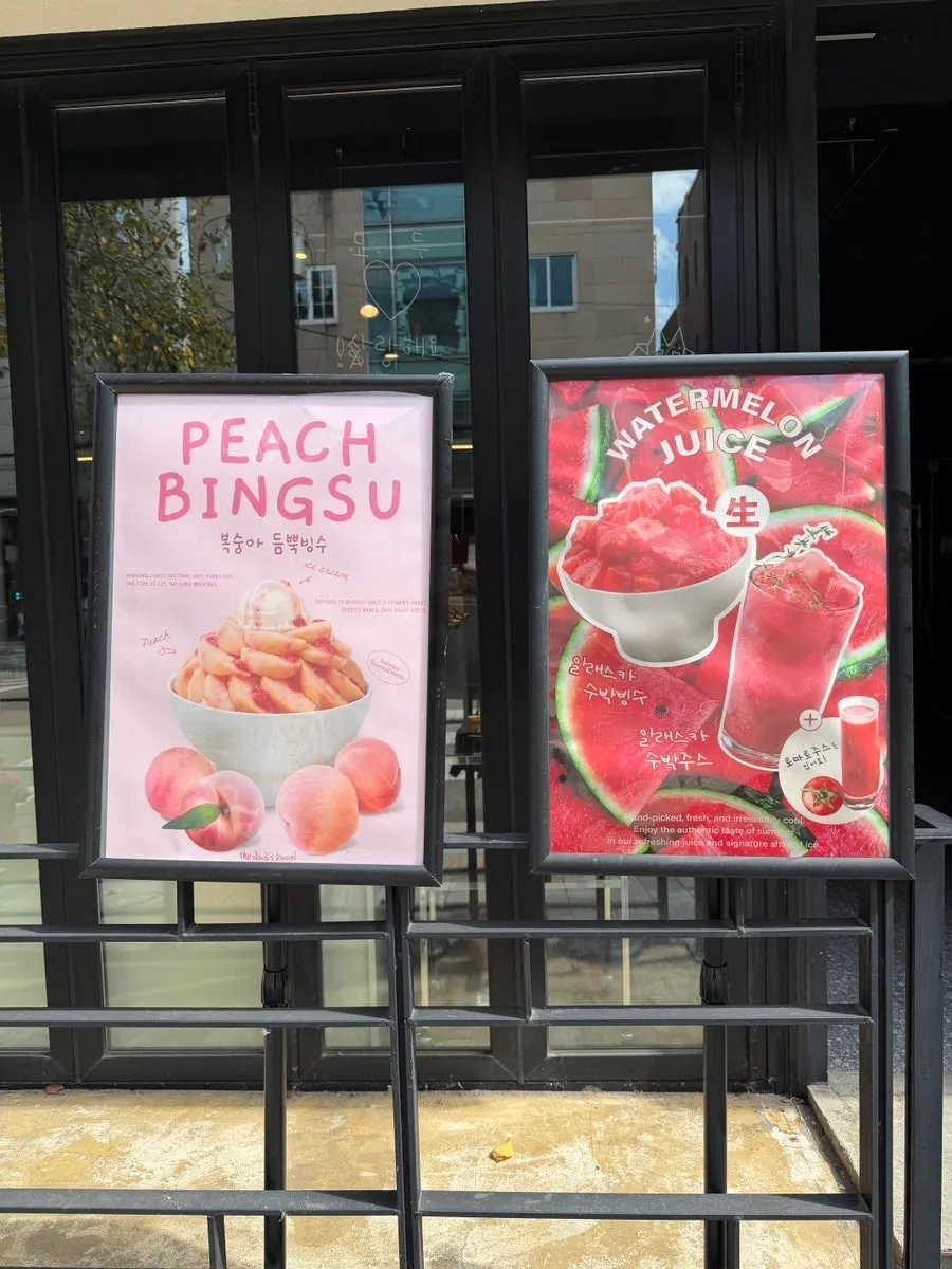 Bingsu and sandwich menu board placed outside the shop