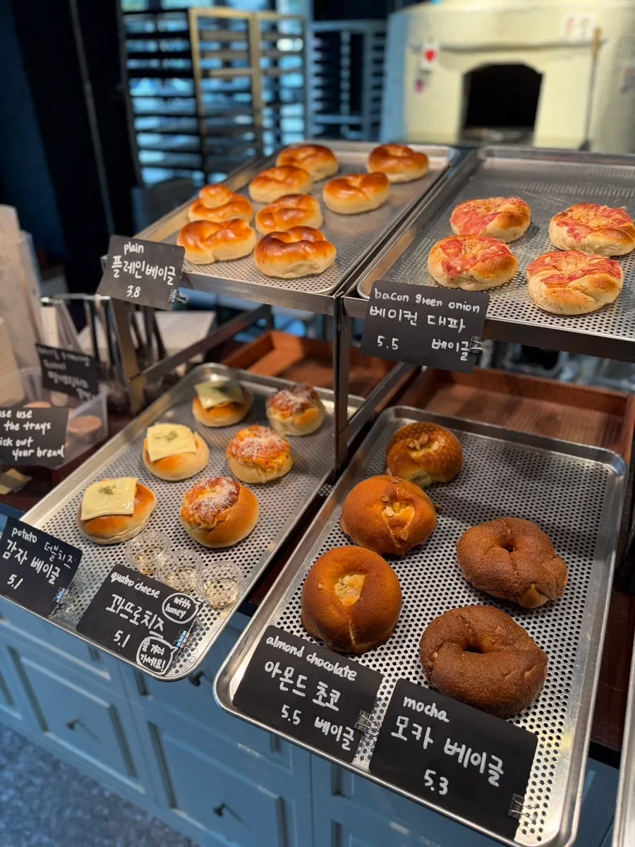Wood-fired bagels displayed in the case
