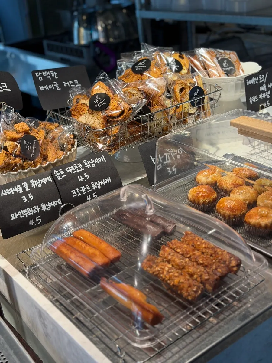Display shelf with bagel names and price tags
