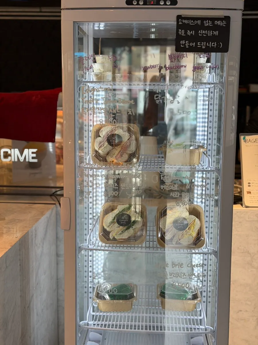 Display case holding sandwiches