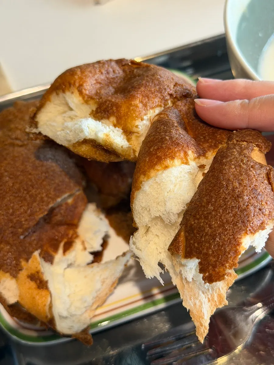 A thick, bun-shaped mocha wood-fired bagel