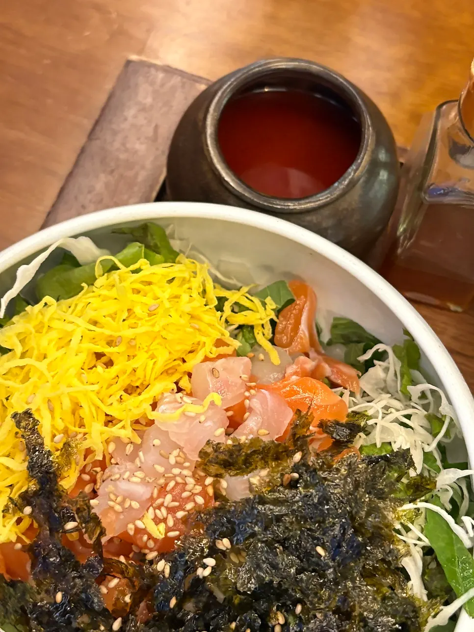 Sashimi rice bowl with sesame oil and aged kimchi added