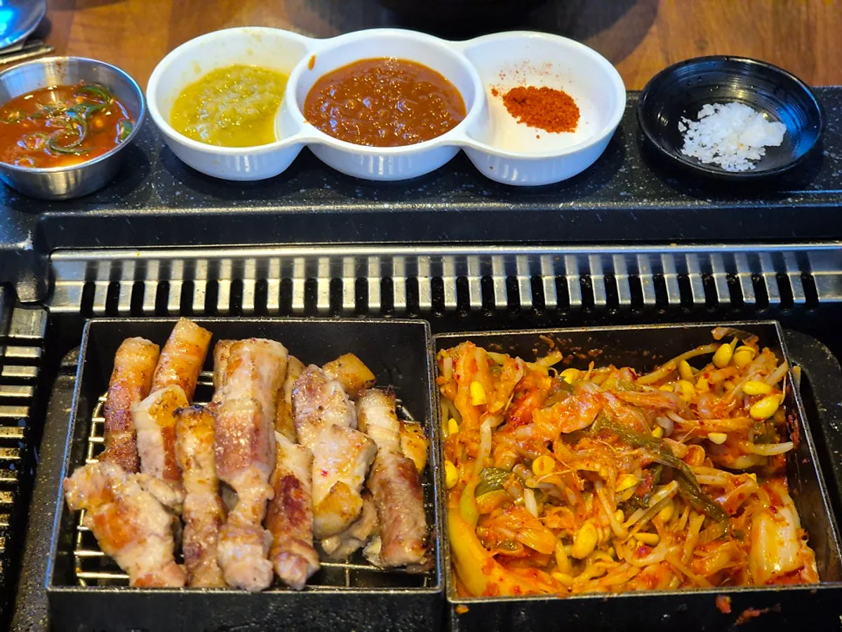 Table spread of the pork belly fondue kimchi stew set