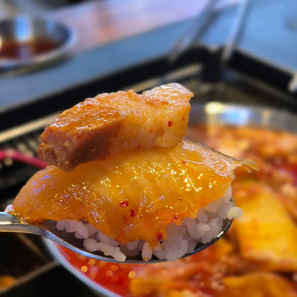 Thoroughly cooked kimchi and large chunks of meat