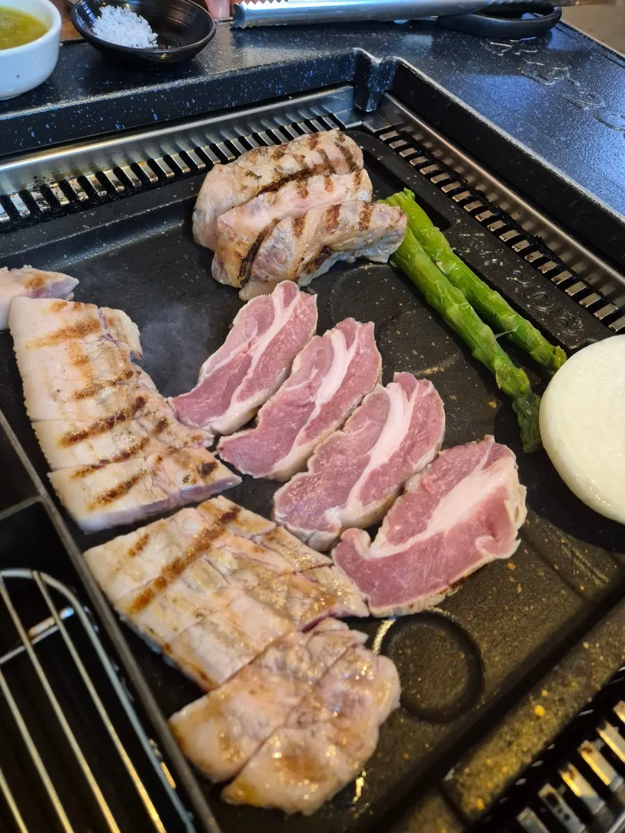 Raw meat placed on the grill