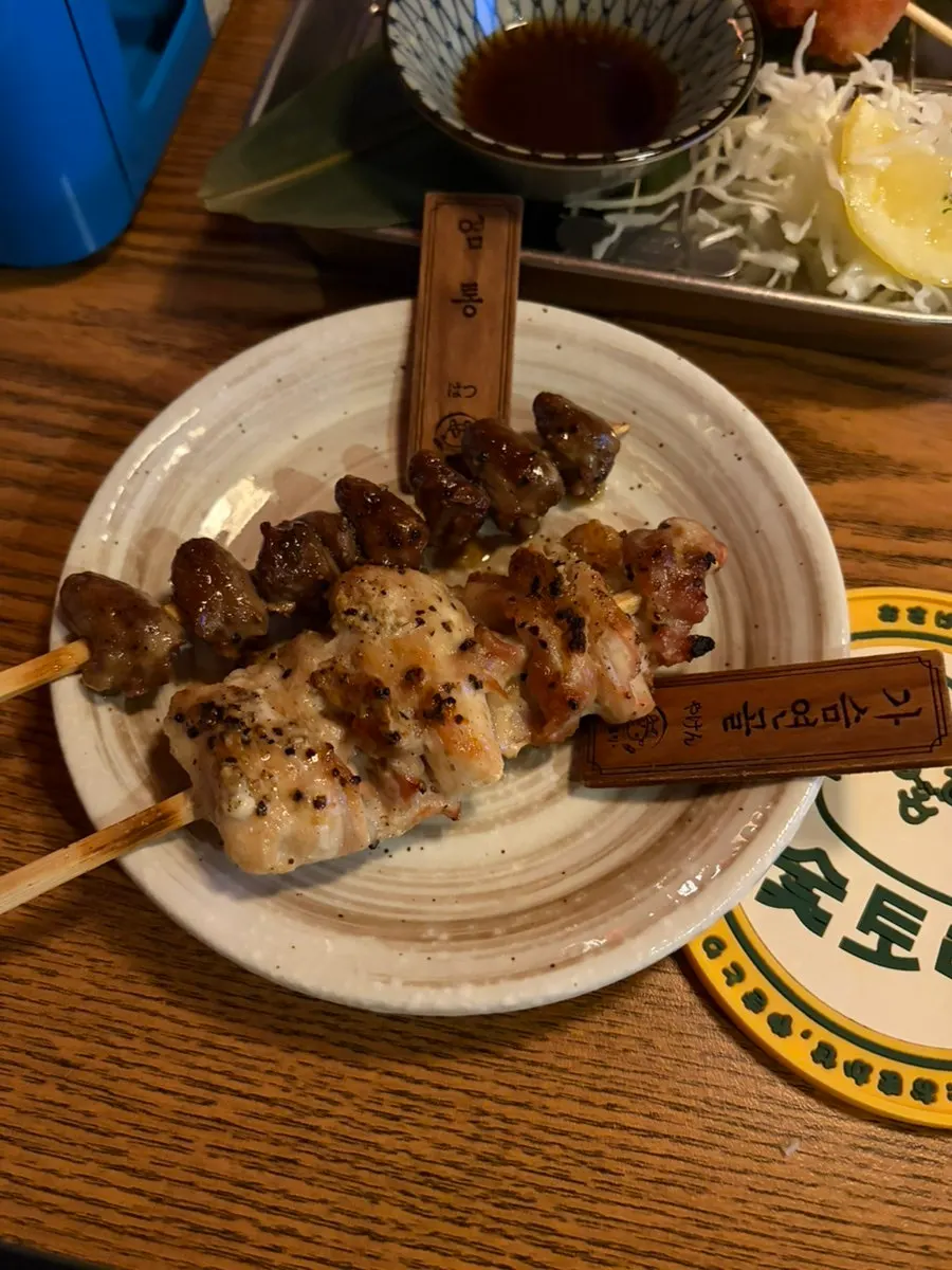 Pork neck and heart skewers from the charcoal omakase