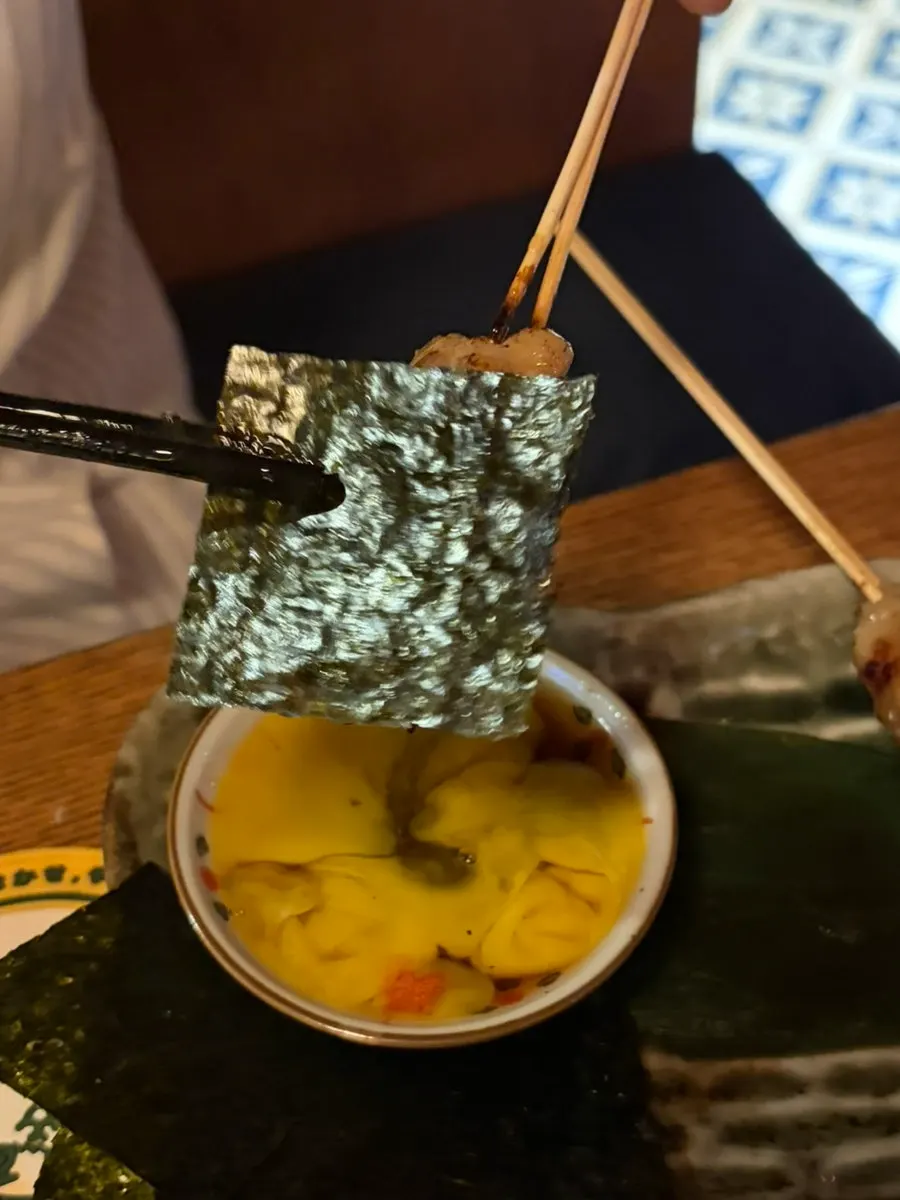Tsukune skewer dipped in egg yolk