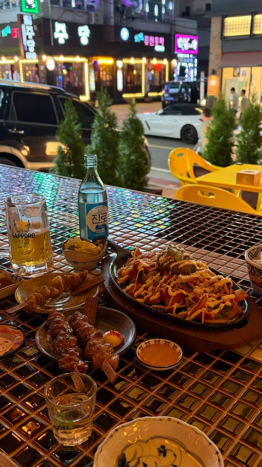 Table filled with skewers and napolitan