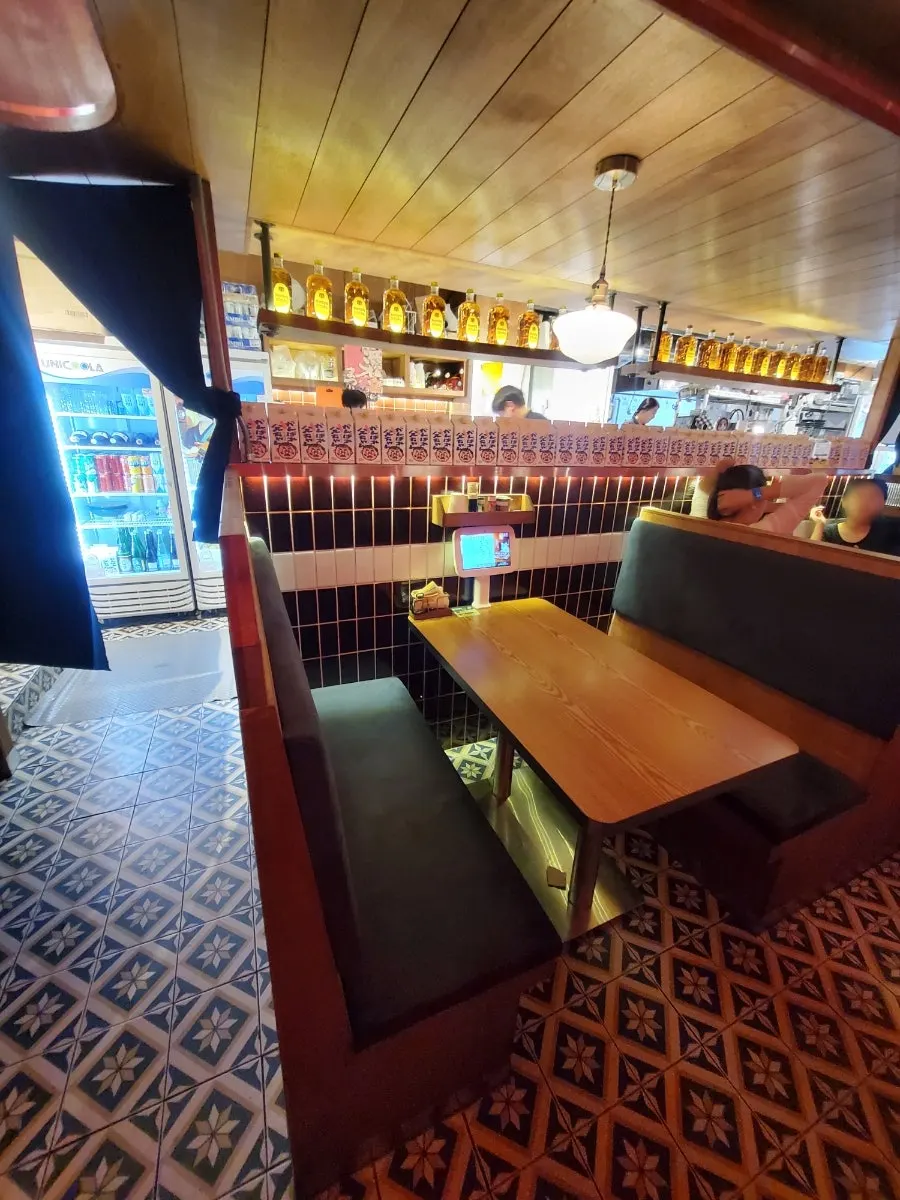 Cozy interior of Soottori Hongdae Hapjeong with sentimental decor and lighting
