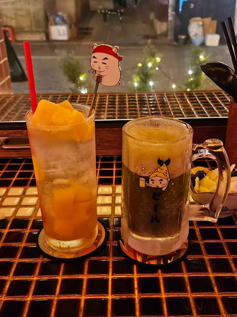 Table setting with matcha ice draft beer and Tori mango sawa