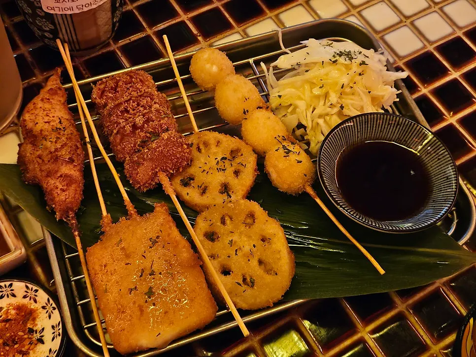 Plate of kushikatsu with fried cheese and lotus root