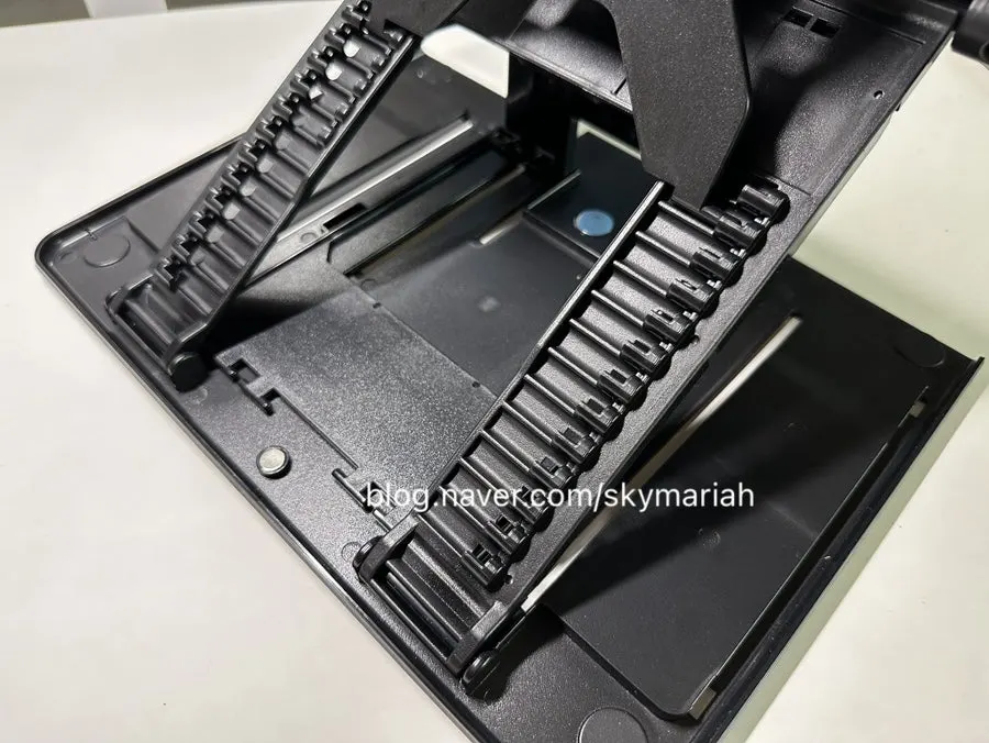 Book stand used as a laptop stand