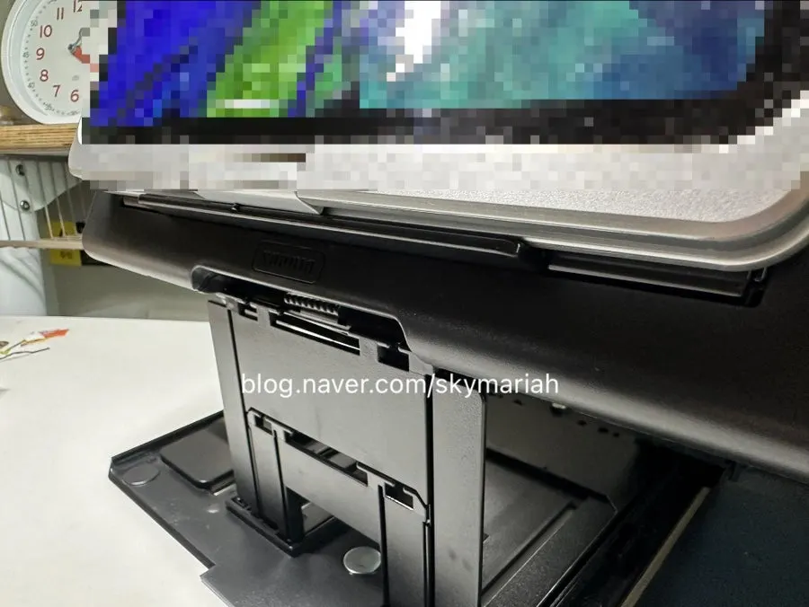 Book stand using the page-holding feature