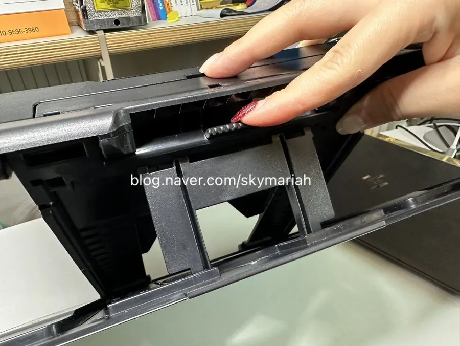 Book stand adjusted to a working height