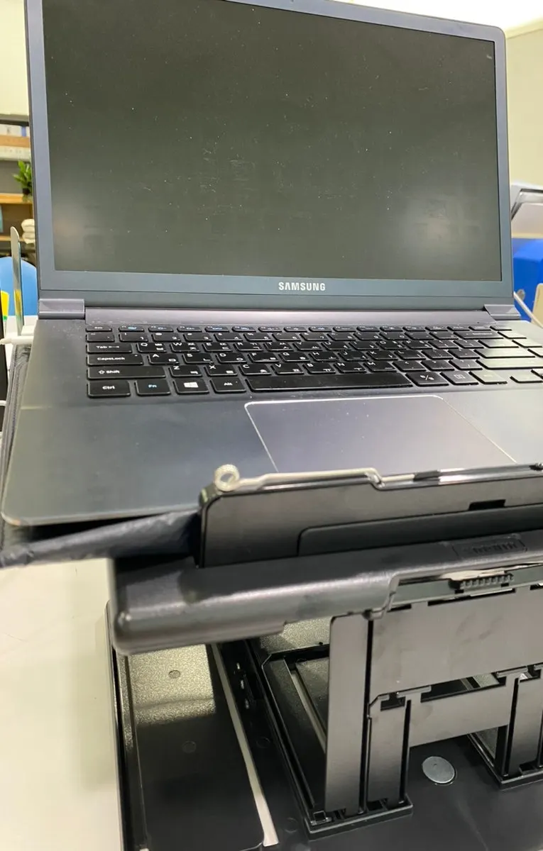 Book stand with the laptop support raised