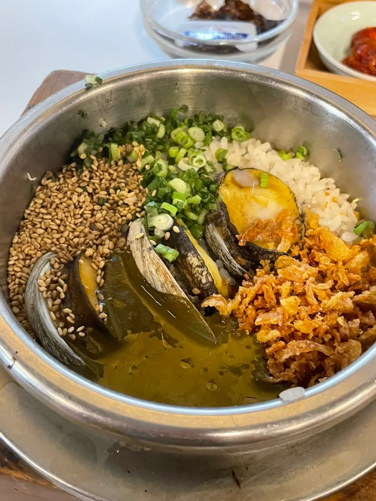 A cup of buckwheat tea with the pot rice table at Sorori