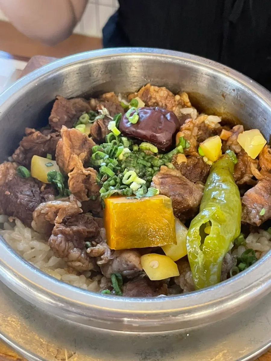 Abalone butter pot rice mixed with abalone innard sauce
