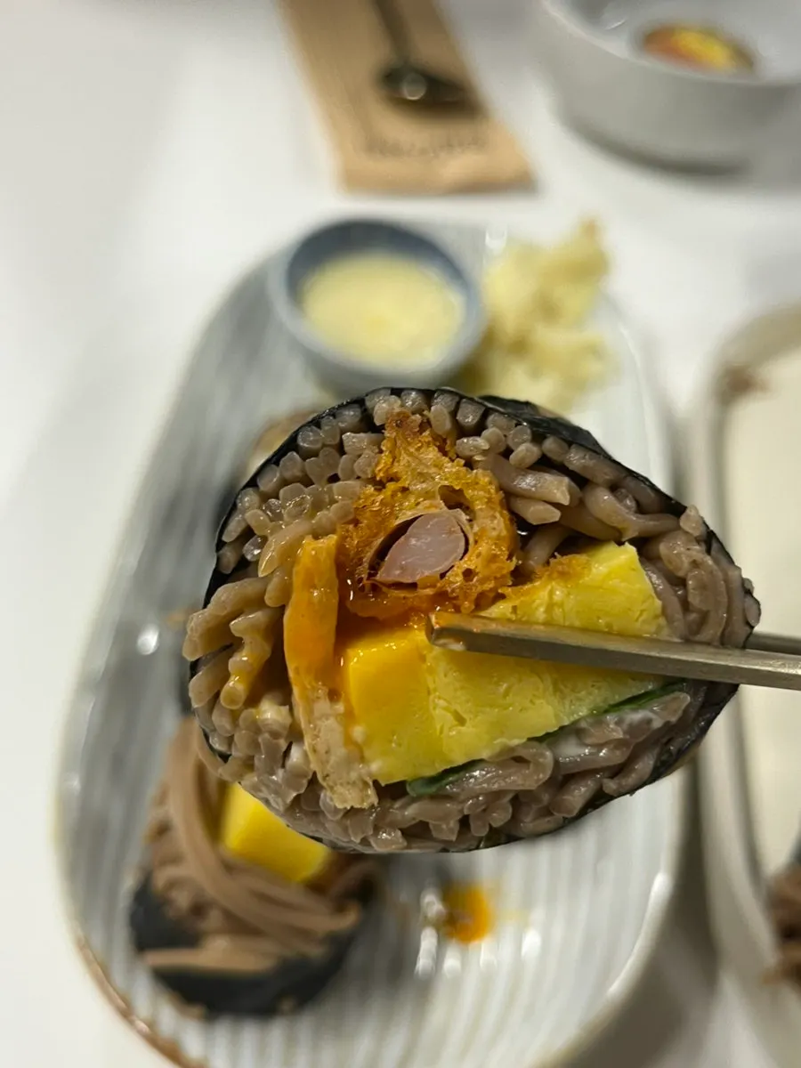 Close-up of a piece of shrimp buckwheat gimbap