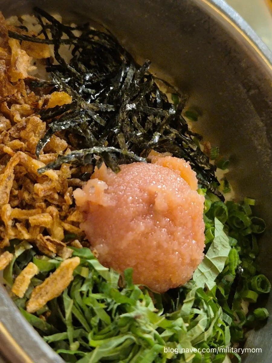 Close-up of pollack roe and butter on the pot rice