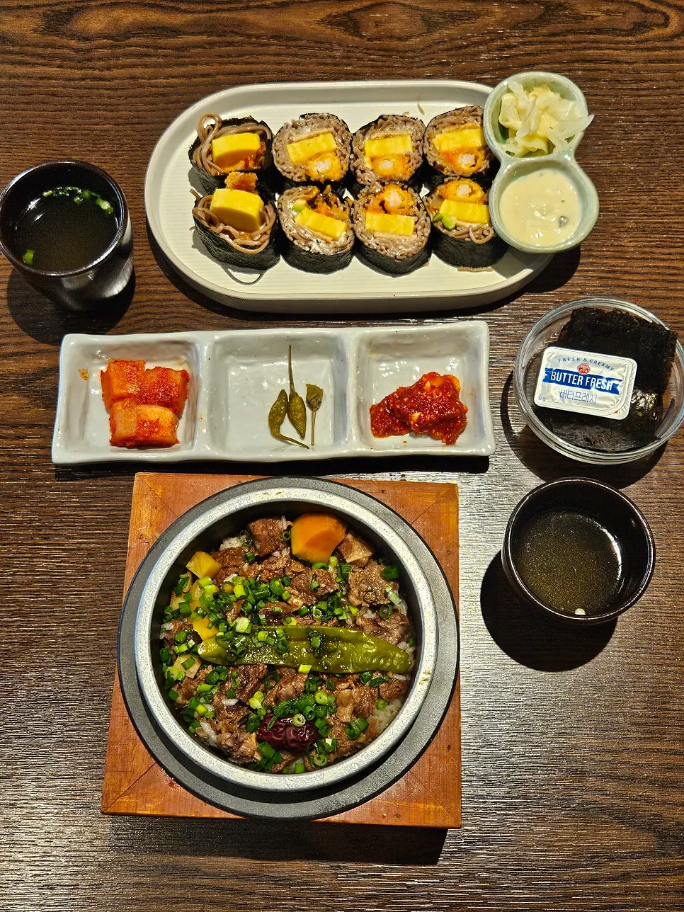 Table setting with ordered pot rice and basic side dishes
