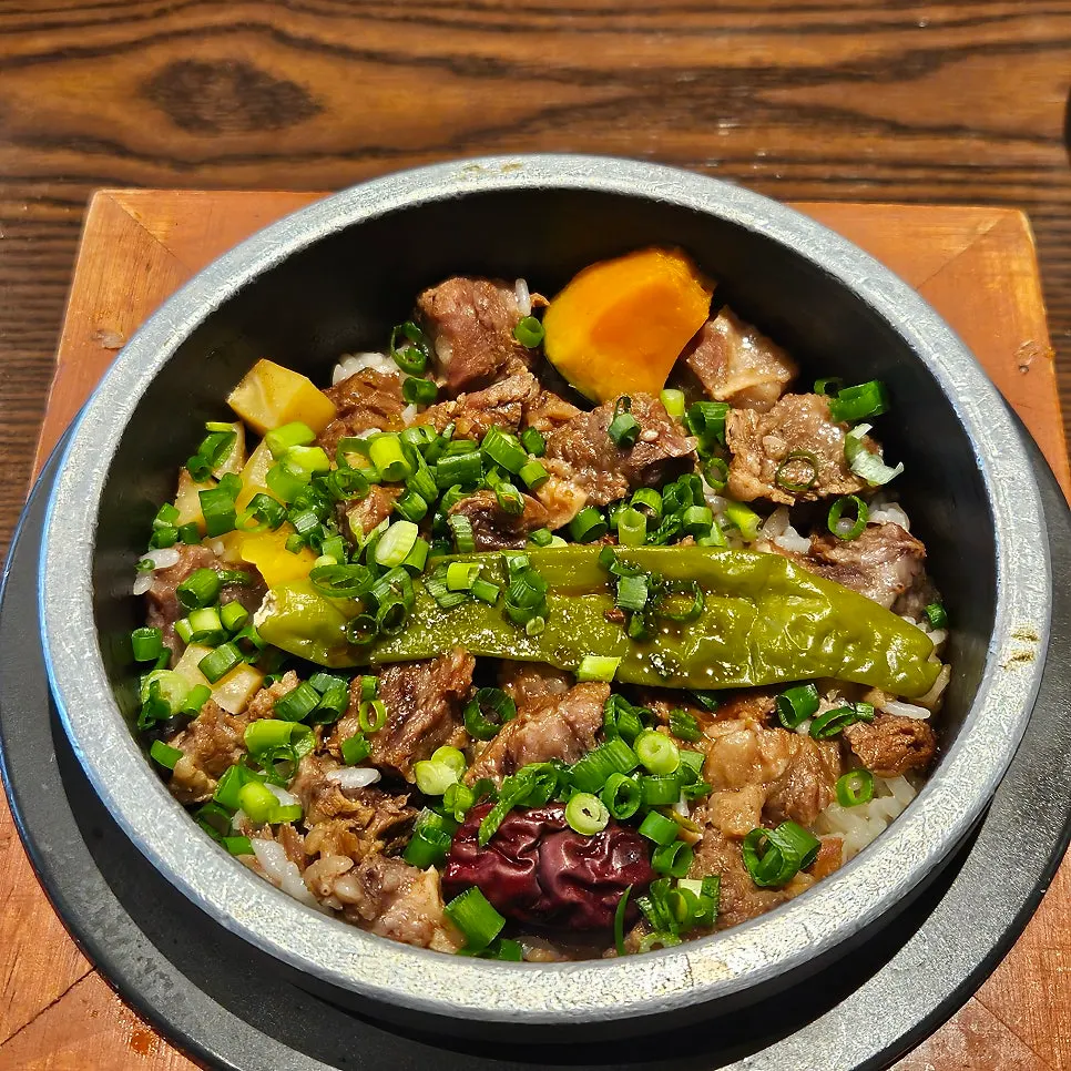 Short rib pot rice topped with butter