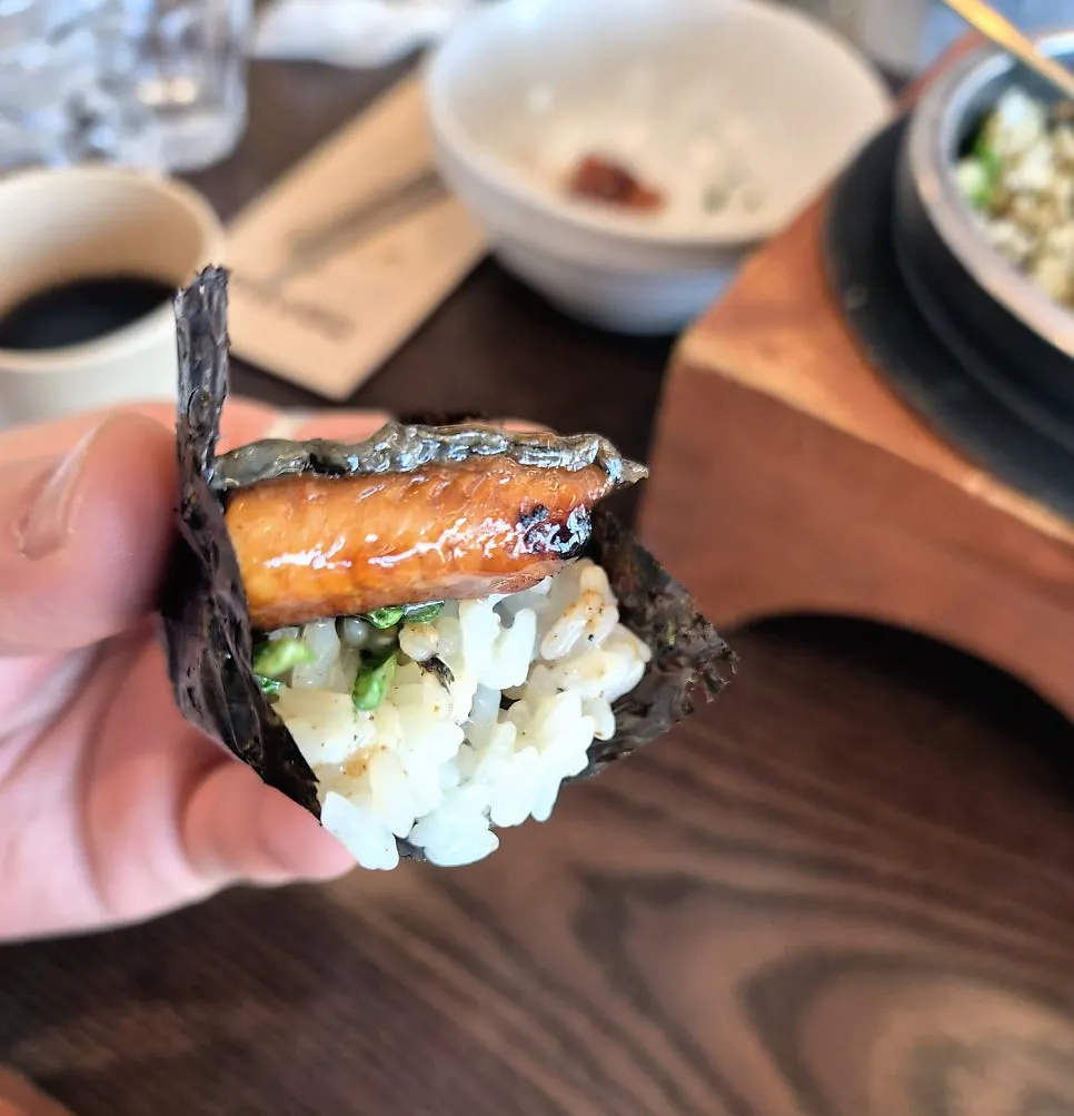 Abalone butter pot rice mixed with geuu sauce, color changed