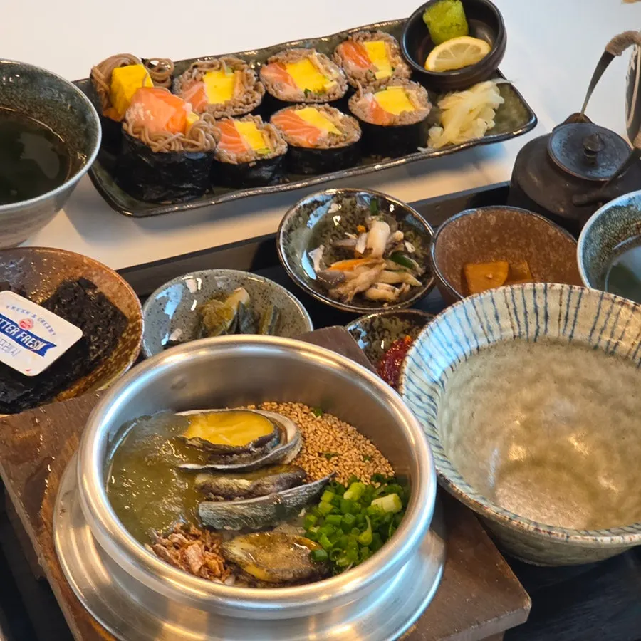 Individual side dishes including seaweed soup and pickles