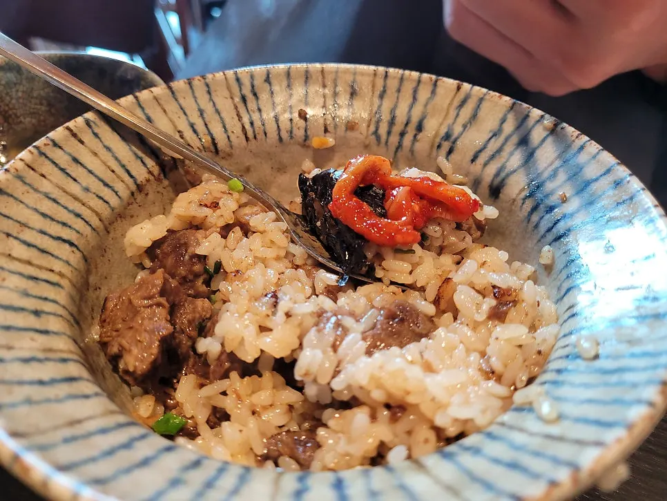 Abalone on top of the abalone butter pot rice