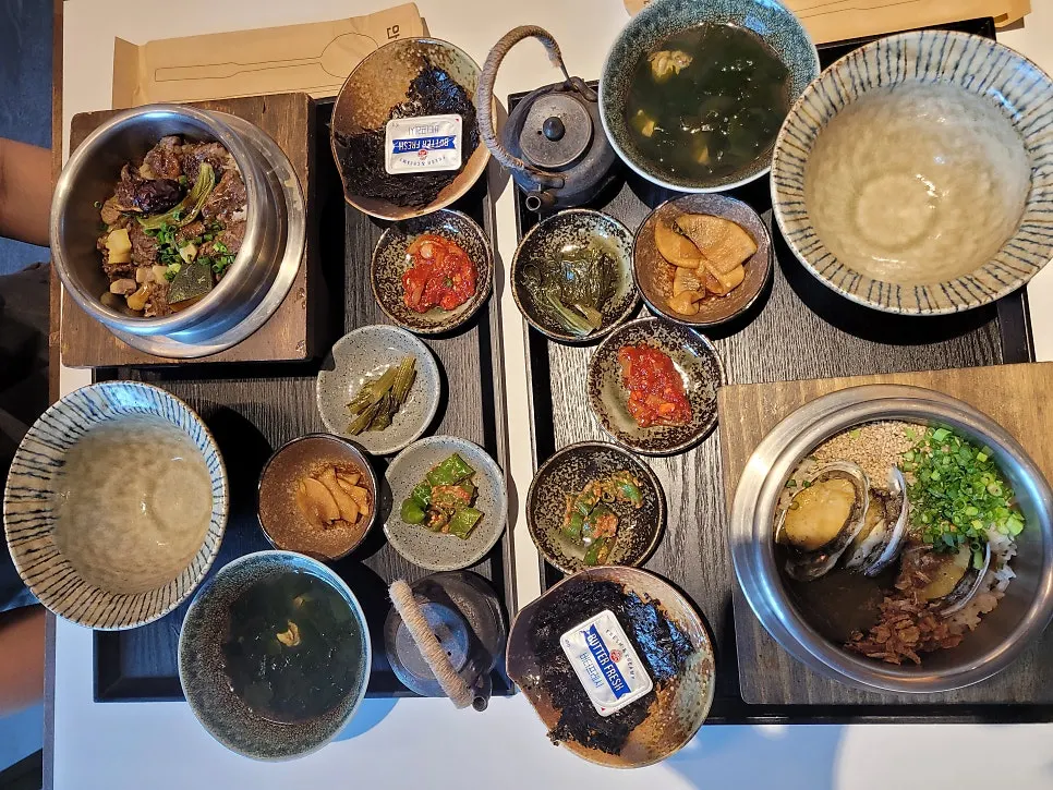 Table with pot rice and side dishes