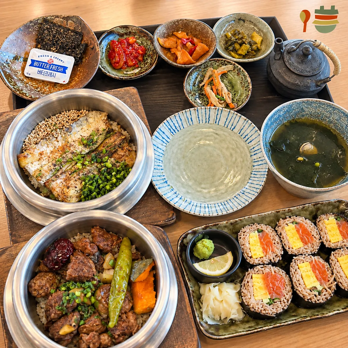 Beef rib pot rice and raw salmon buckwheat gimbap table setting at Sorori Sotbap Gagyeong Direct Branch