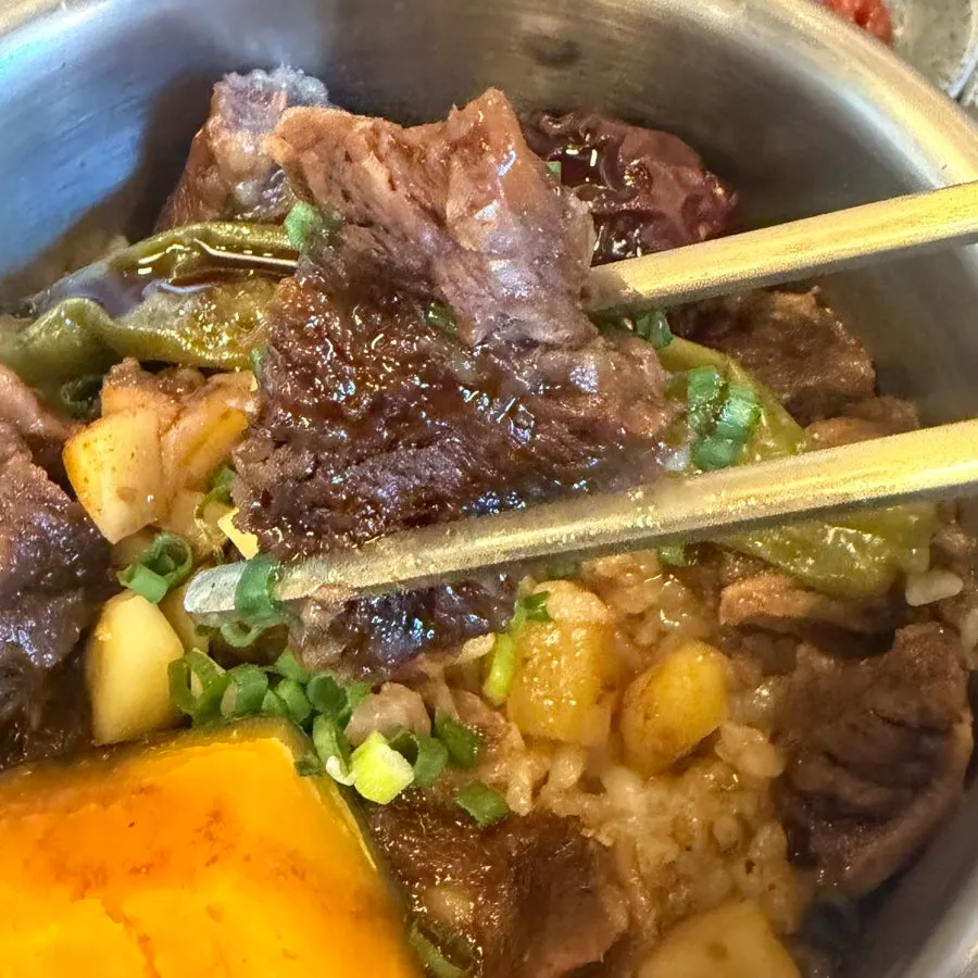 Close-up of thick beef ribs on the pot rice