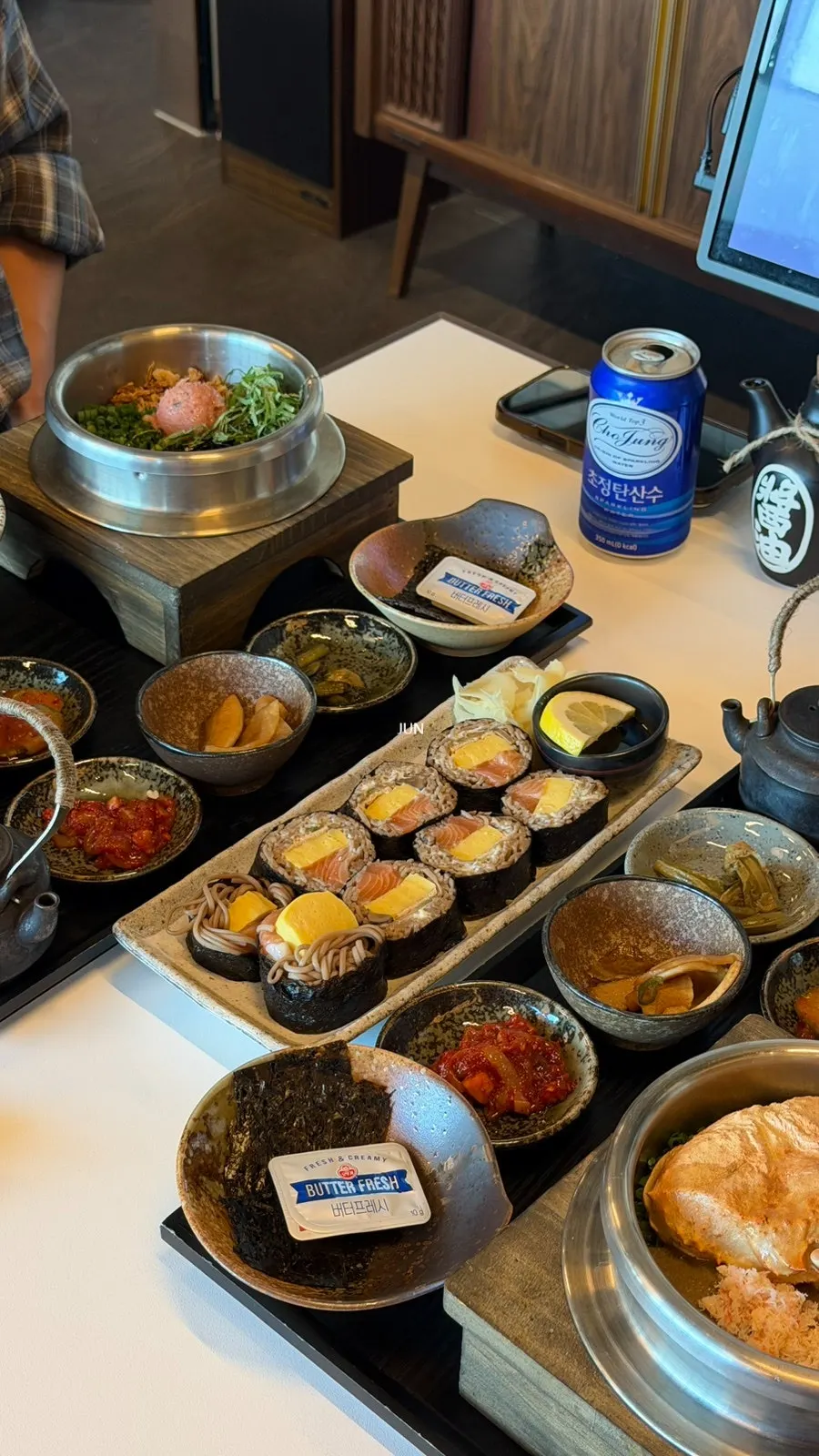 Two pot rice bowls and buckwheat gimbap table setting