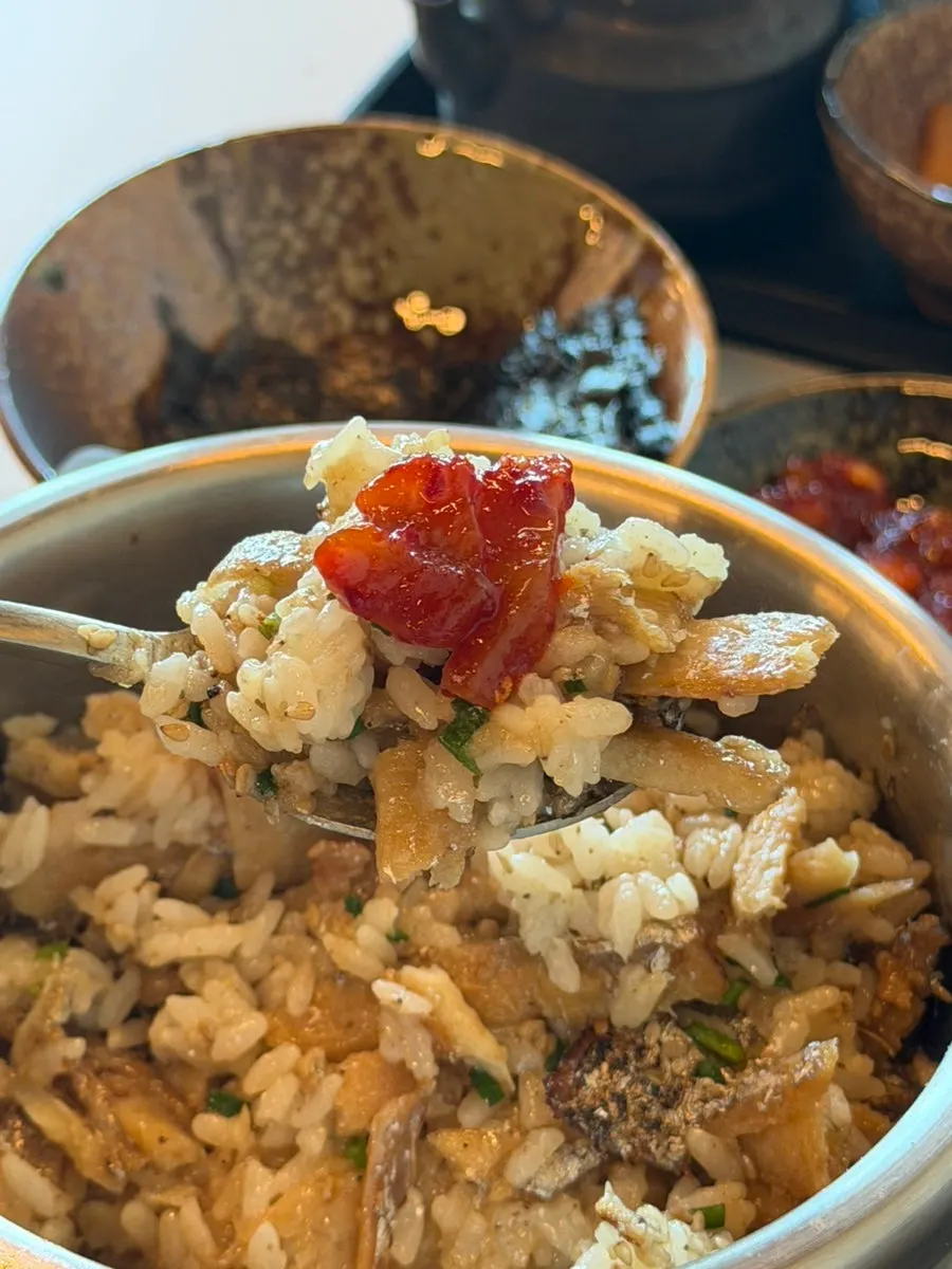 A spoonful of beef rib pot rice