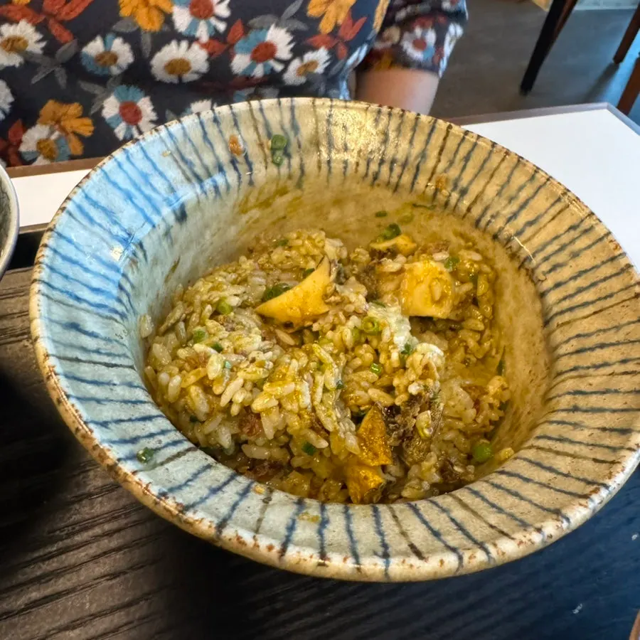 Abalone butter pot rice topped with chewy abalone